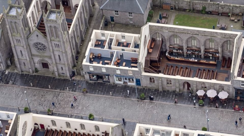 An aerial view of Belmont Street with the roofs removed, showing the rooms inside.