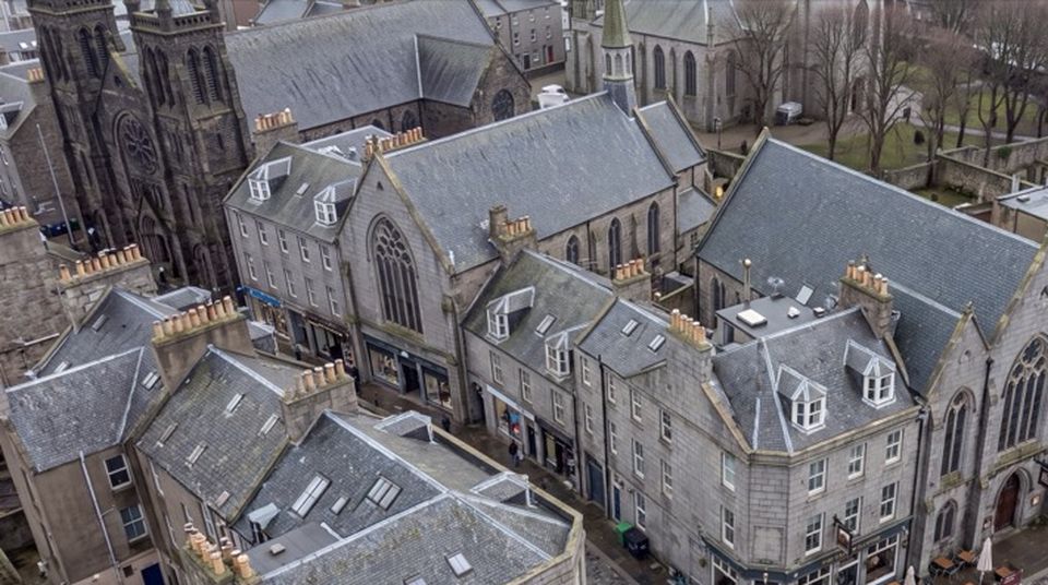 The same aerial view of Belmont Street with the roofs on.